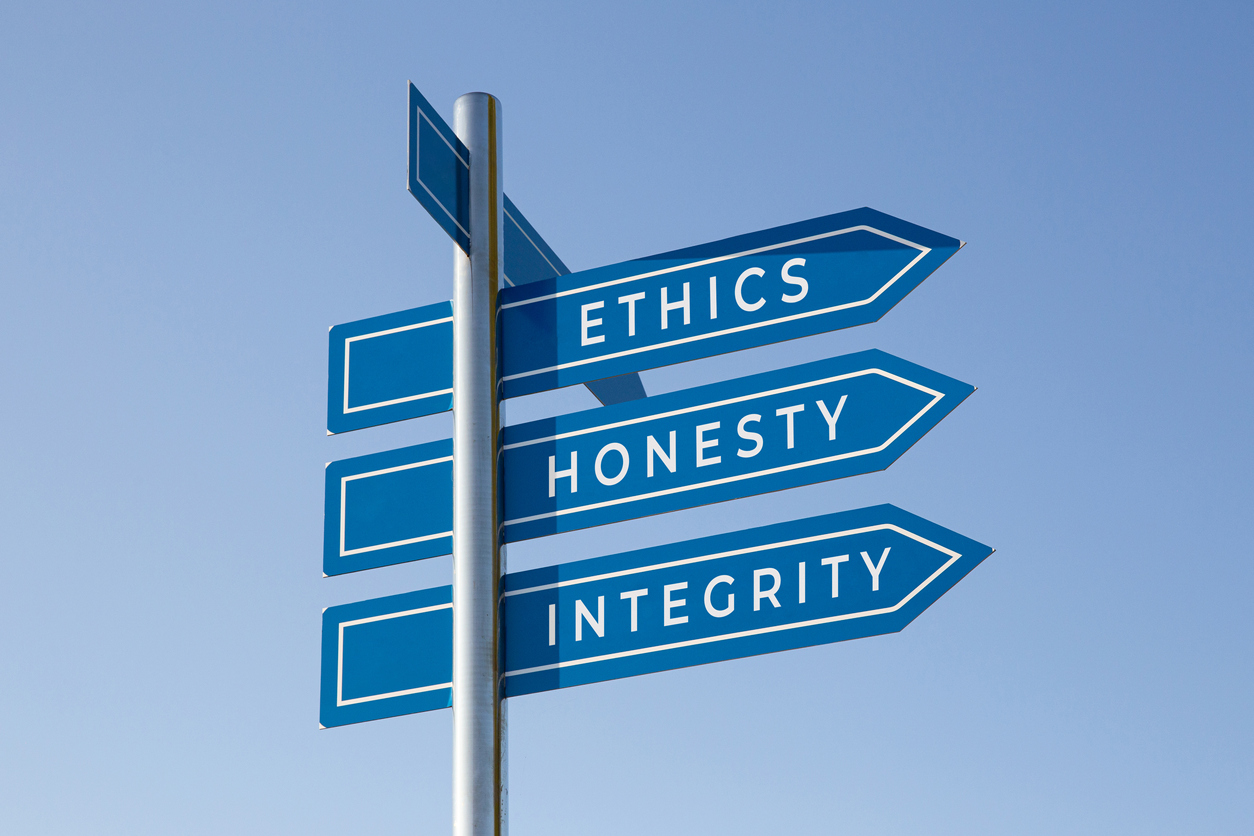 Ethics, Honesty, and Integrity directional signs representing our core values