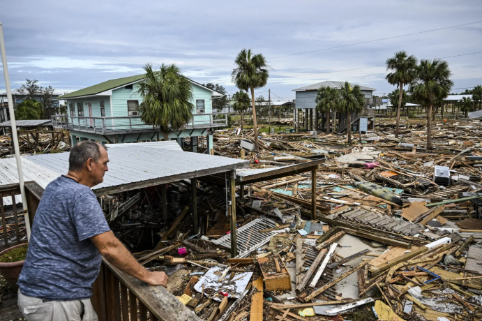 Extensive hurricane damage showing destroyed homes and debris in Florida coastal community